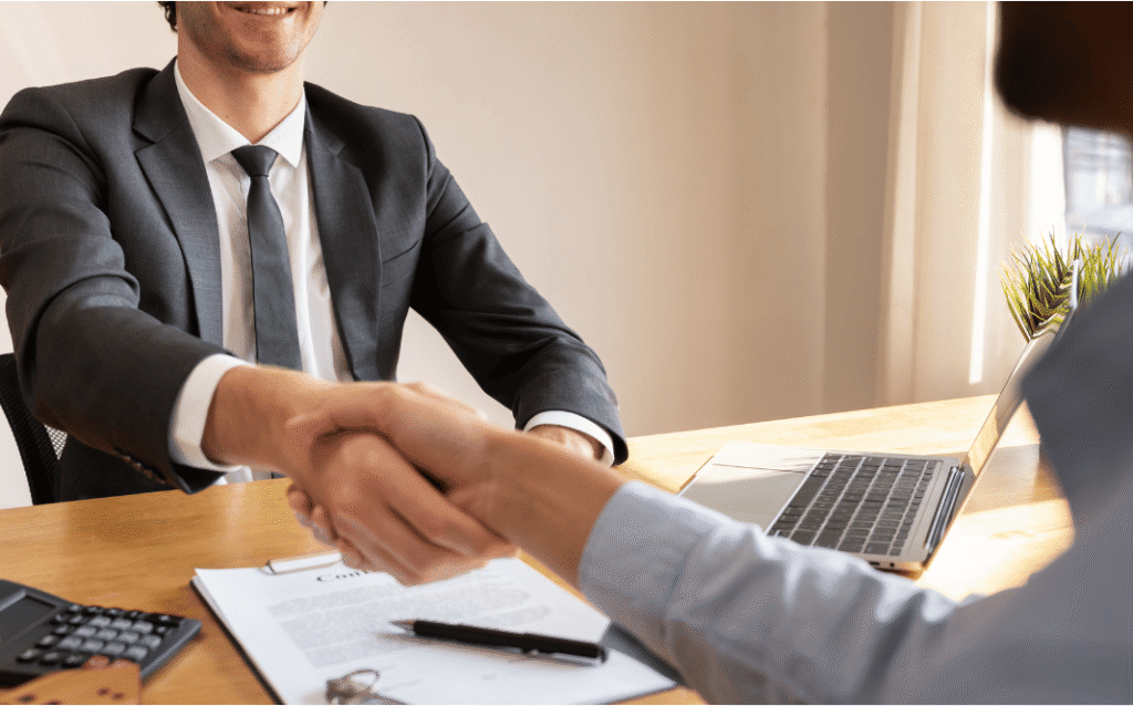 Business broker meeting with a small business owner in Ontario to discuss selling a company