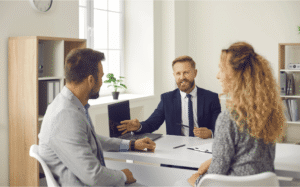 Business owner preparing a company for sale by reviewing valuation, financial documents, and buyer requirements